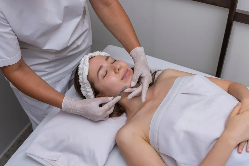 A woman in Bellmore, NY, is undergoing a dermaplaning treatment.