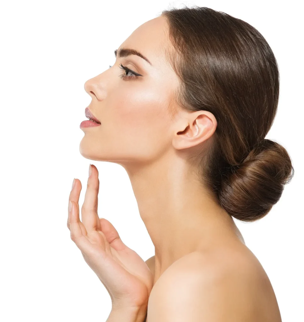 A woman displays her profile, likely after a Kybella treatment in Long Island.